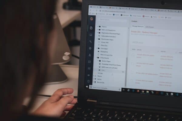 Person looking at a computer screen.